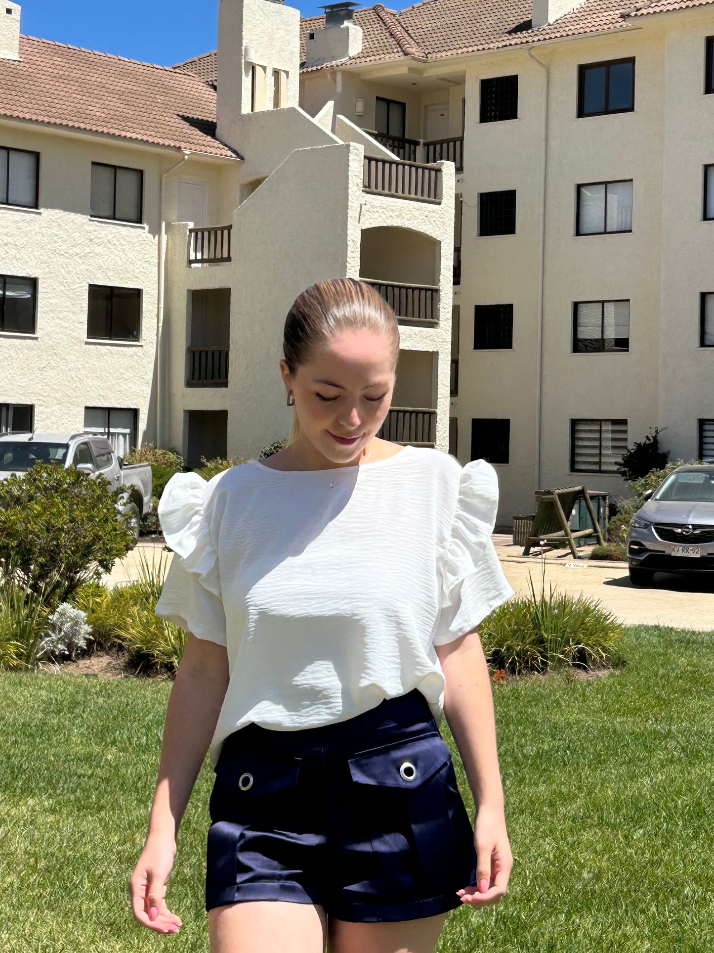 Polera margarita blanca